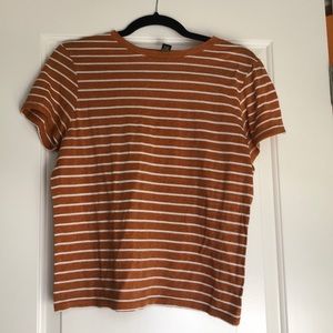 Orange and white striped shirt sleeve tee